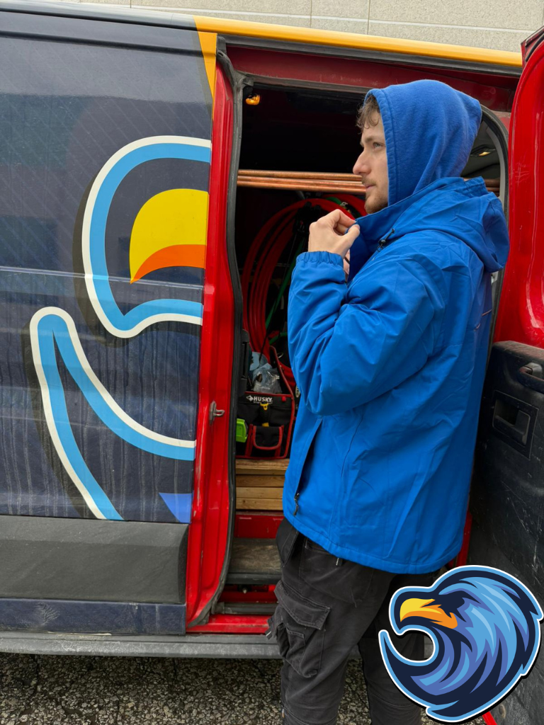 Plumber standing aside of plumbing truck in Etobicoke - Delta Plumbers