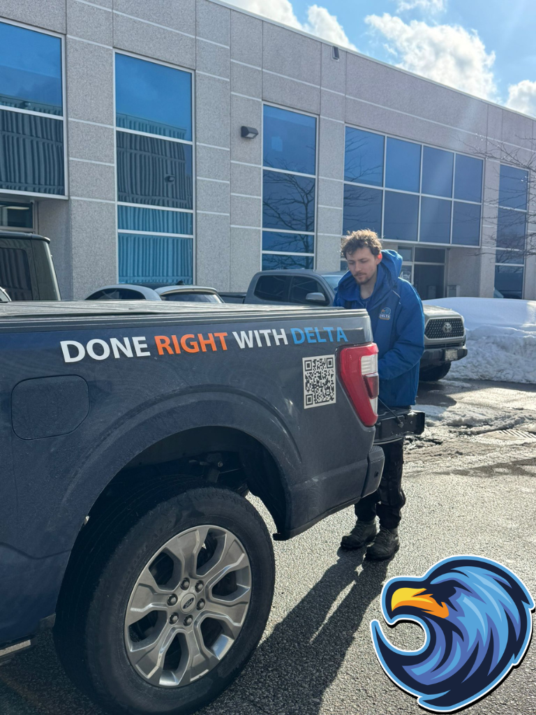 Plumber taking out plumbing tools from a plumbing truck in Etobicoke - Delta Plumbers