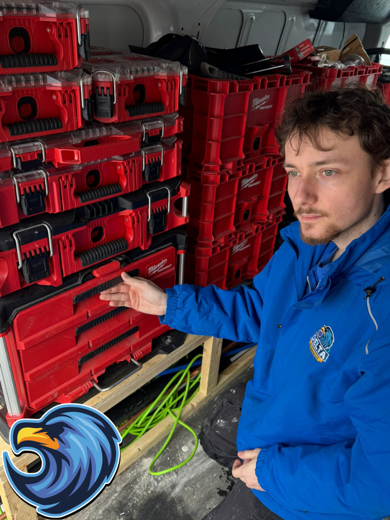 Plumber with plumbing tools - Delta Plumbers Cambridge