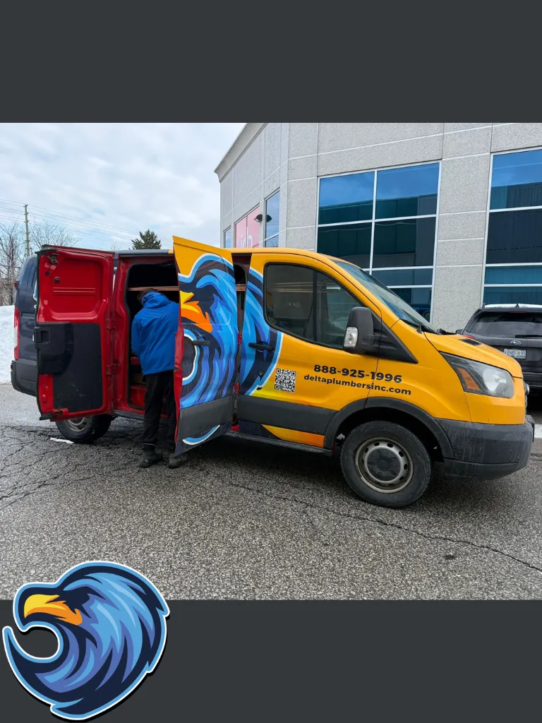 Plumbing Truck with a Plumber taking tools - Delta Plumbers of Etobicoke